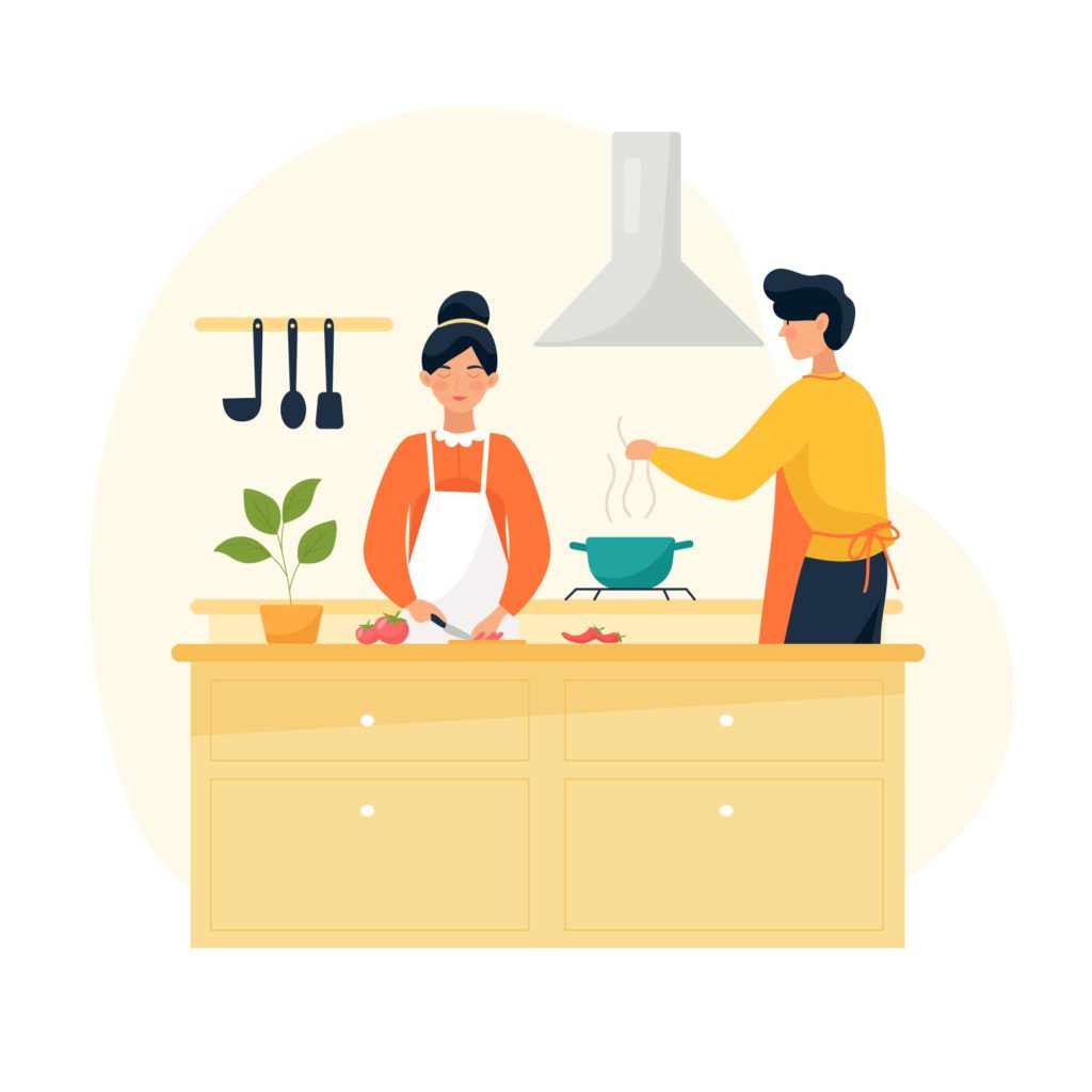 a young couple are cooking in the kitchen